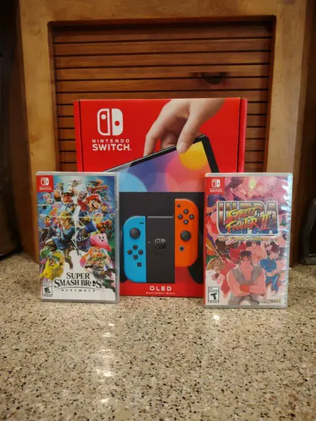 Nintendo Switch OLED - 2 Jeux Inclus