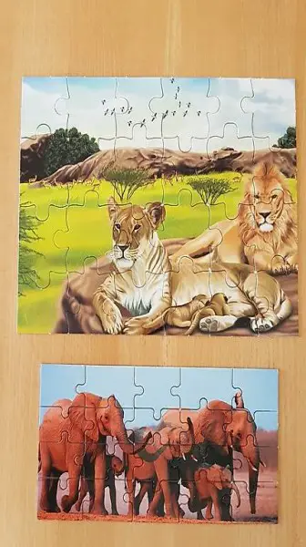 Puzzle Löwen und Elefanten