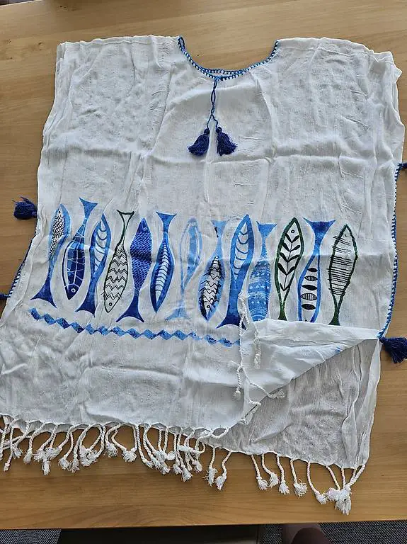 Schöner neuwertiger Badeponcho