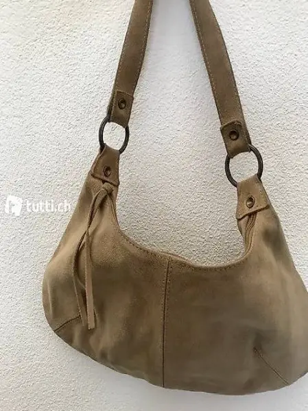 Süsse Handtasche aus Wildleder