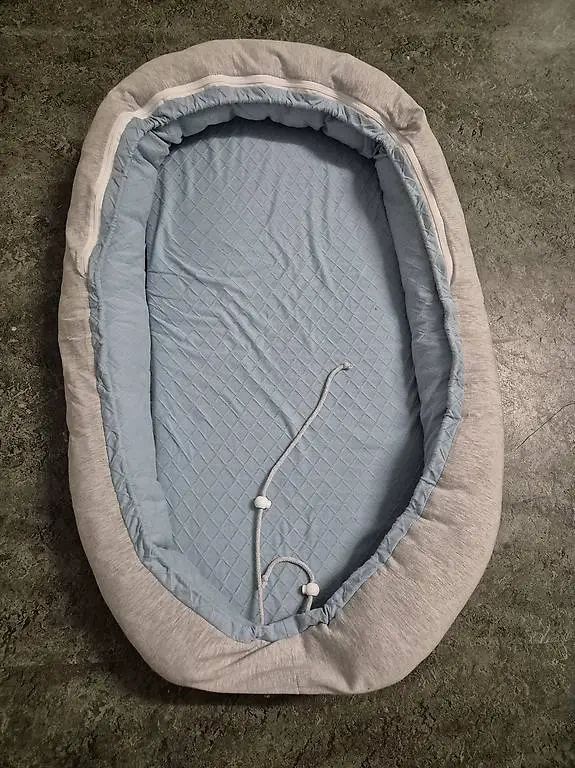 Babynest hellblau/grau