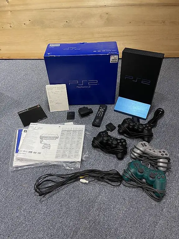 Sony PlayStation 2 - Originalverpackung, Aluminium-Stand