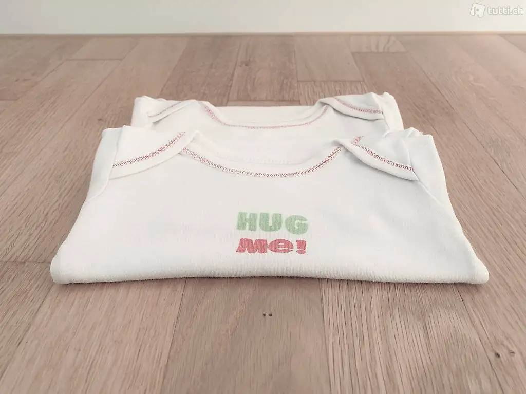 2er Set Babybody Body Gr. 74 "Hug me" "50% Mummy 50% Daddy"