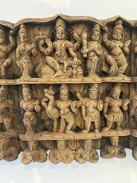 A carved wooden panel, India