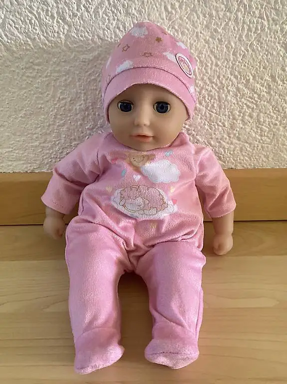 Puppe mit Puppenkleider und Zubehör