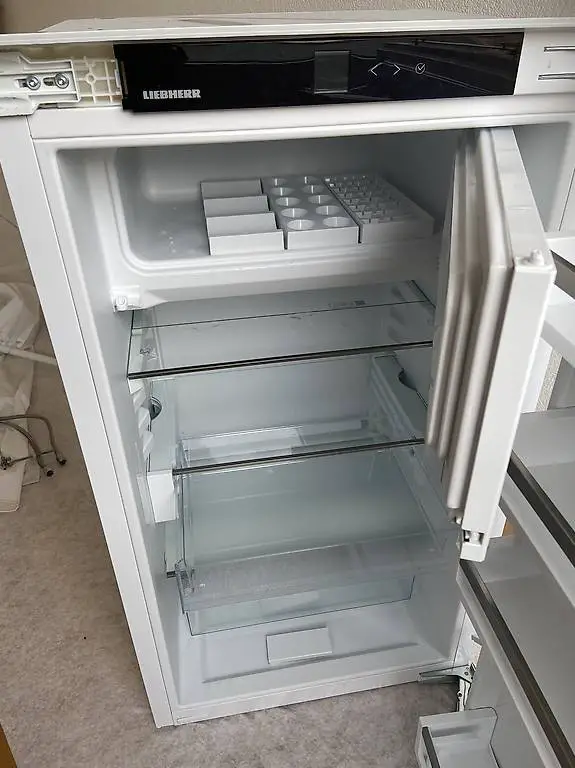 Frigo avec petit congélateur intégré Liebherr