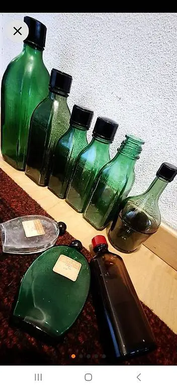 Antike Apothekerflaschen im Lot