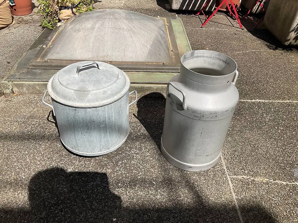 Milchkanne und Zuber