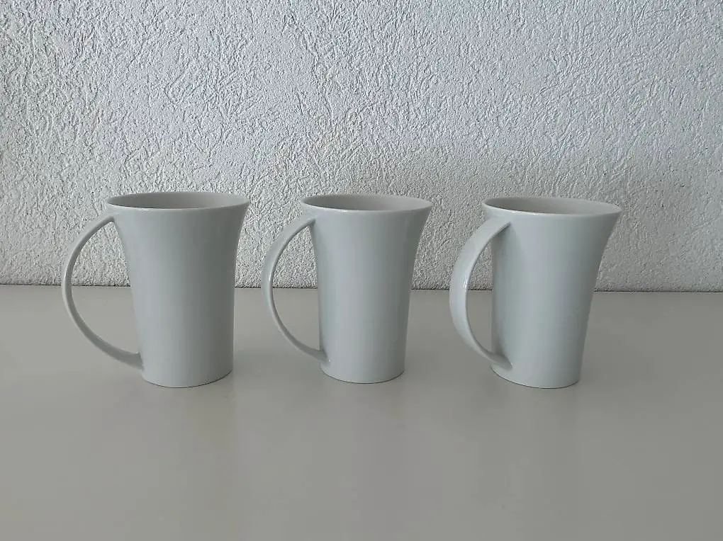 8 weisse Porzellantassen wie neu