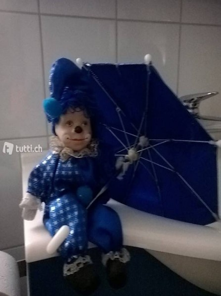 Clown mit Regenschirm