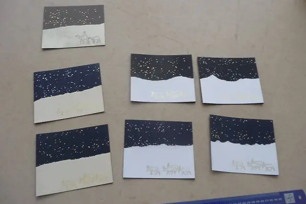 Sieben Faltkarten mit Rentieren oder Dromedaren