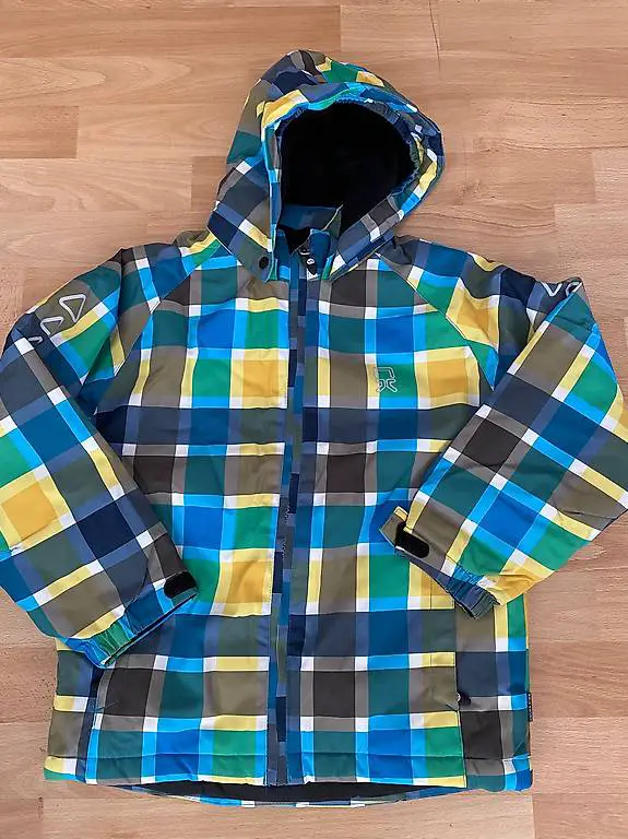 Veste d"hiver 122-128 cm comme neuve
