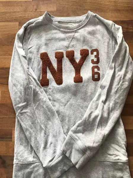 Pulli hellgrau, NY 36 Aufdruck / Grösse 146-152