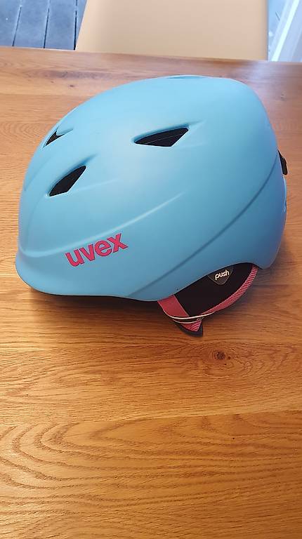 Kinderskihelm Uvex, türkis