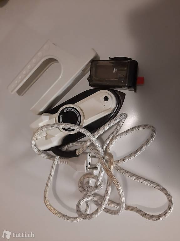 Piccolo ferrro da stiro da viaggio