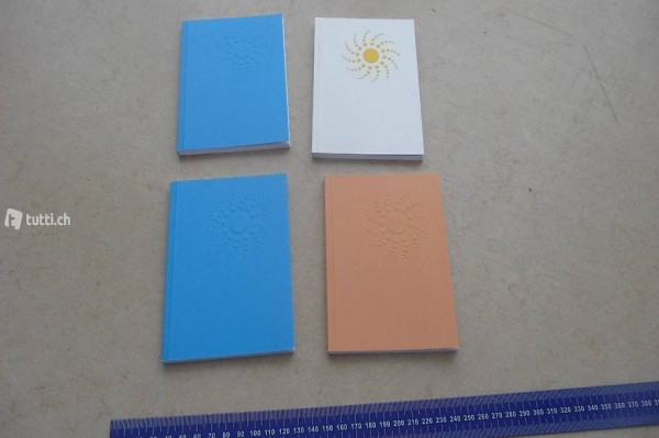 Vier Broschuren Sonnenmotiv