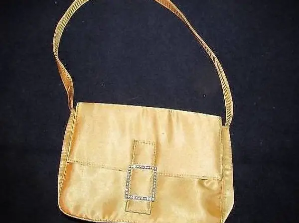 Elegante gelbgoldene Tasche