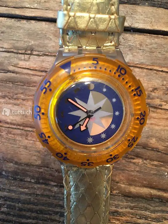 goldene Swatch Damenuhr