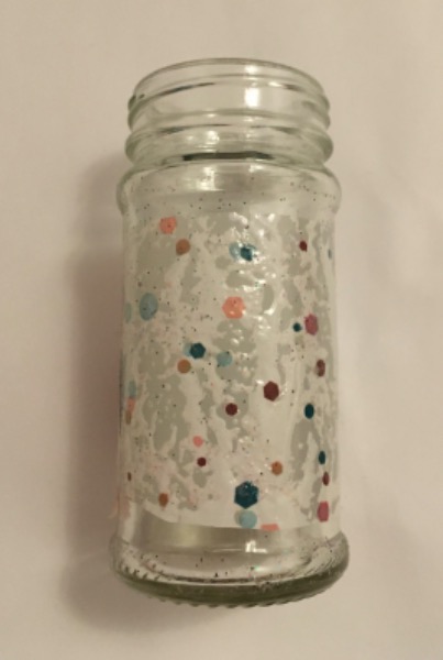 Glasvase mit Collage