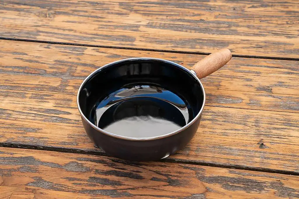 Fondue Caquelon mit Holzgriff