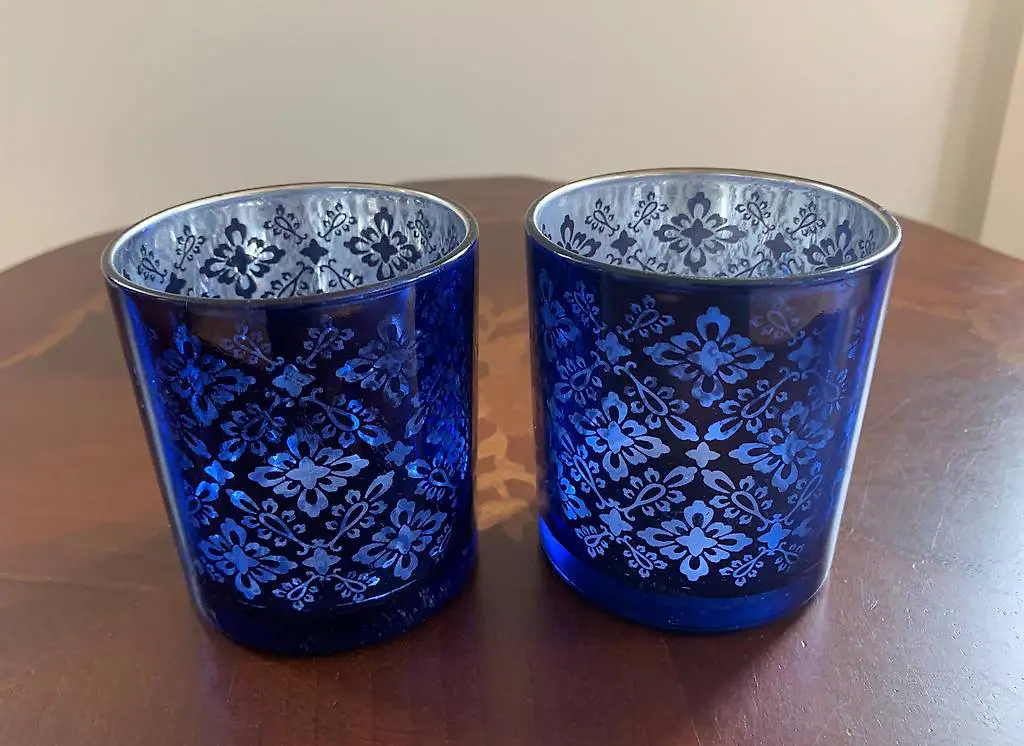 2 schöne Kerzenhalter aus Glas wie NEU