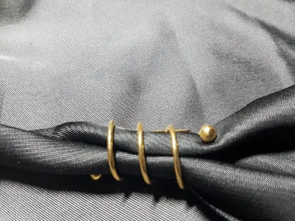 Brosche Gold Spiralförmig