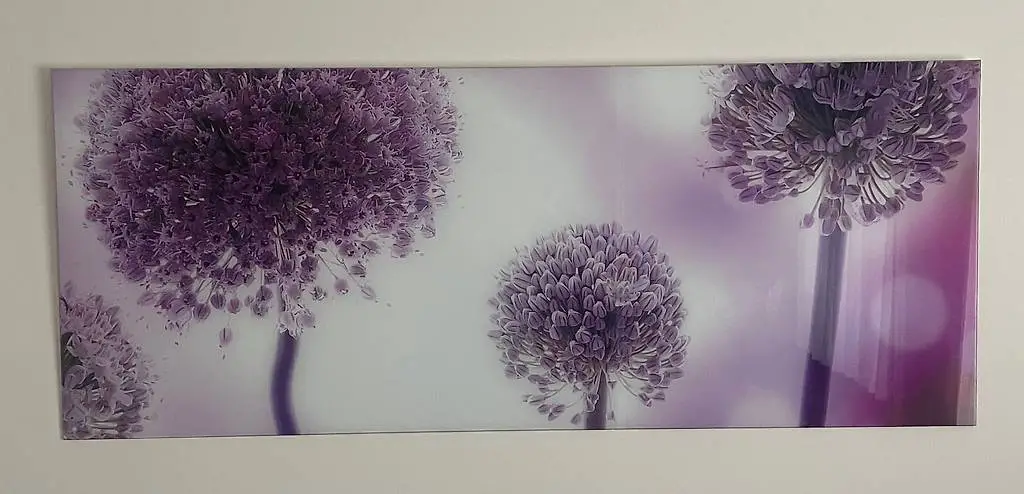 Blumenbilder in violett auf Glas
