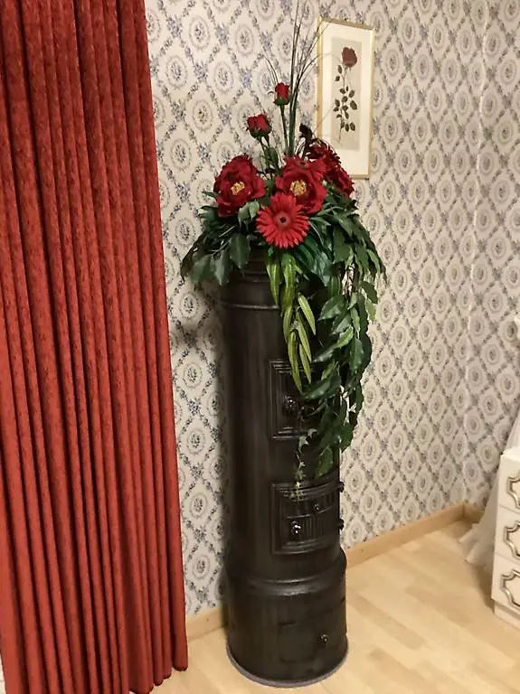 Kanonenofen inkl. Blumendekoration