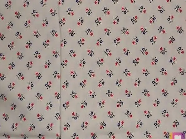 Couture-Stoff Baumwolle weiss mit rot/blau/grünem Blumenmust