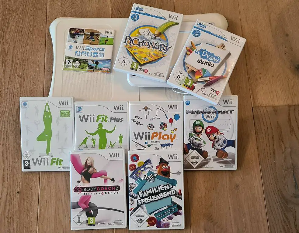 Wii Konsole mit einem Steuerungselement Zubehör und Spielen