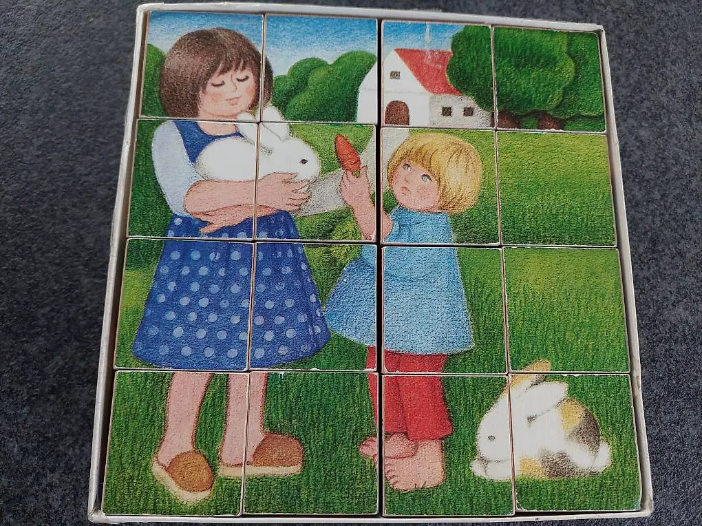 Holzpuzzle, 16 Würfelteile, 6 Bilder