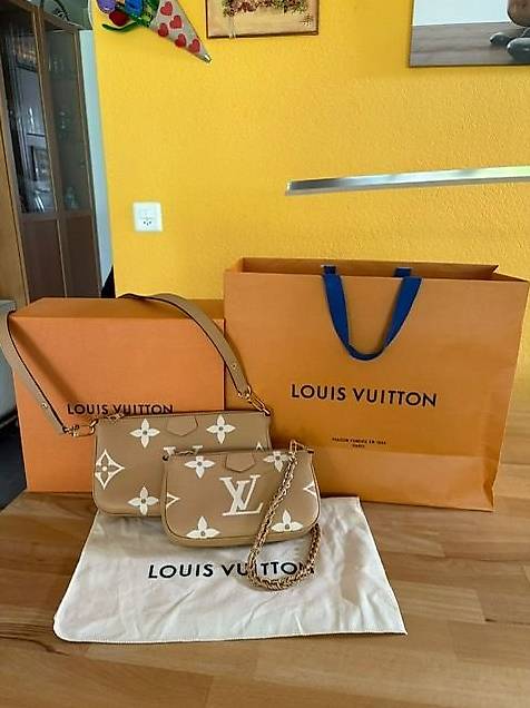 Louis Vuttion Multi Pochete EMP A.C original