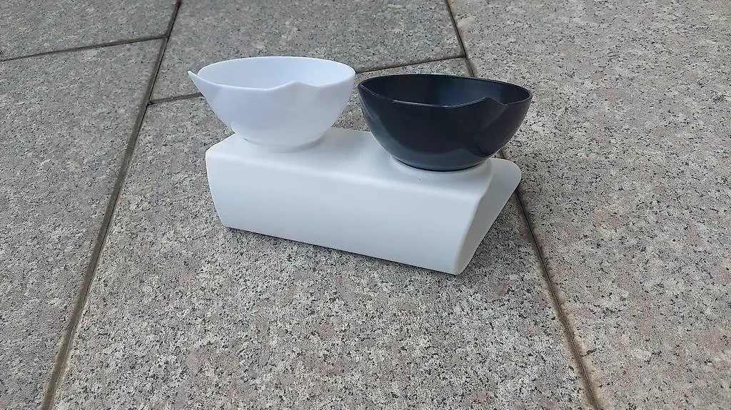 Ciotole per gatto a forma di gatto?