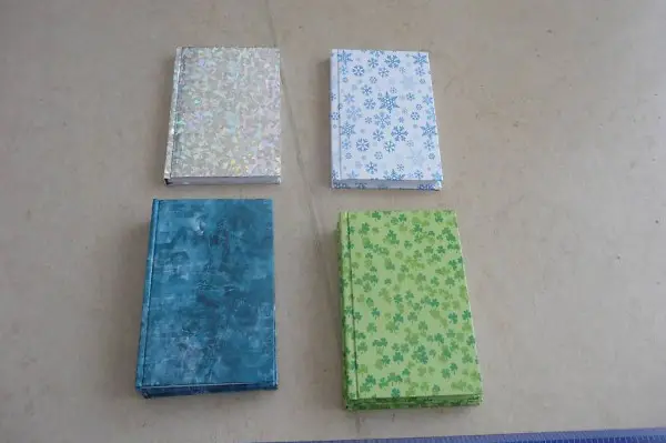 Notizbücher (Kleeblatt, blau, silber, Schneesterne)