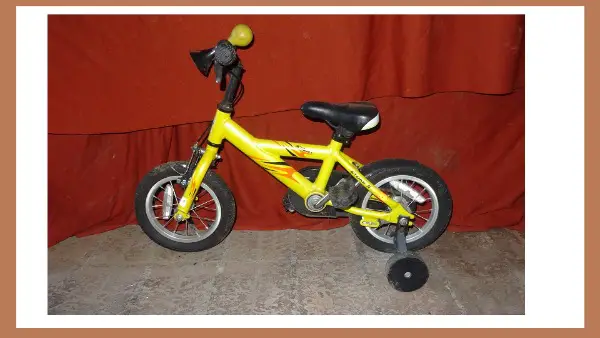 Kindervelo mit Schutzräder