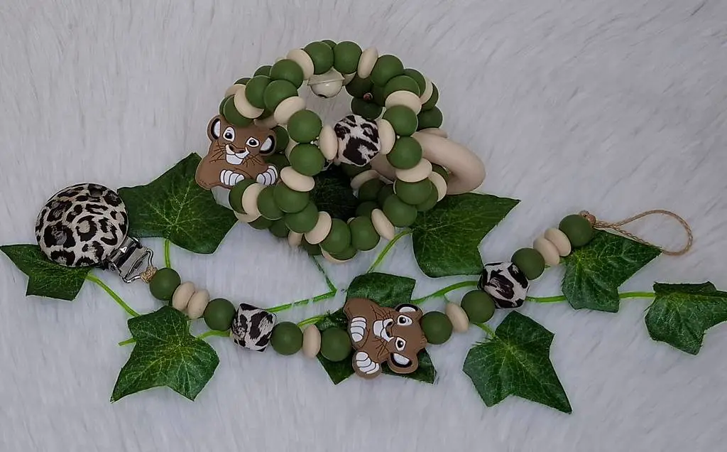 Set Nuggiketteli + Motorik-/Greifball Kleiner Löwe