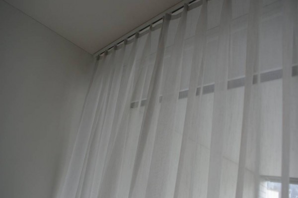3 Stück weisse Vorhänge.