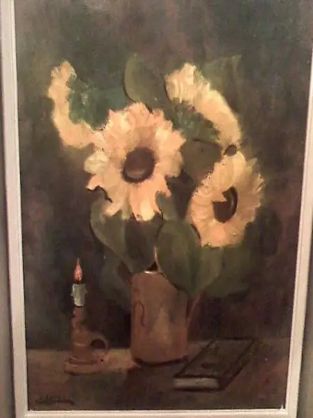 stilleben mit Sonnenblumen und Kerze