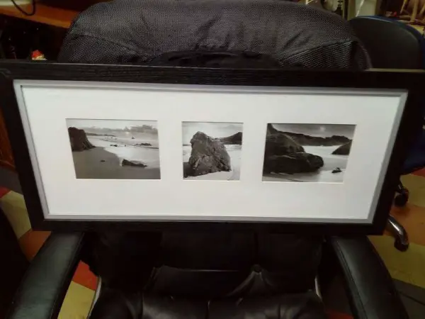 Ein älterer länglicher Bilderrahmen mit 3 Bilder