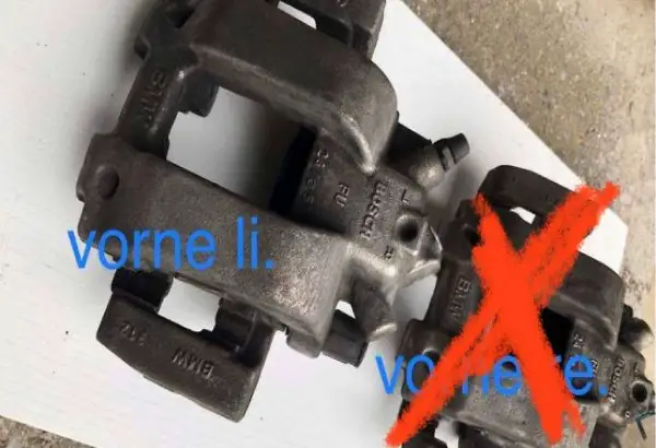 Original BMW Teile Bremssattel + Träger vorne li.