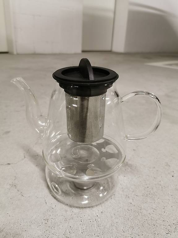 Teekrug mit wärmendem Untersatz