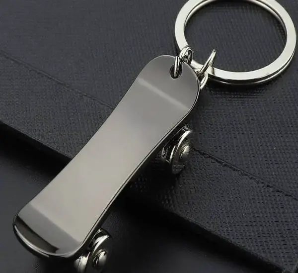 Schlüsselanhänger Skateboard Rollbrett Tony Hawk Ollie