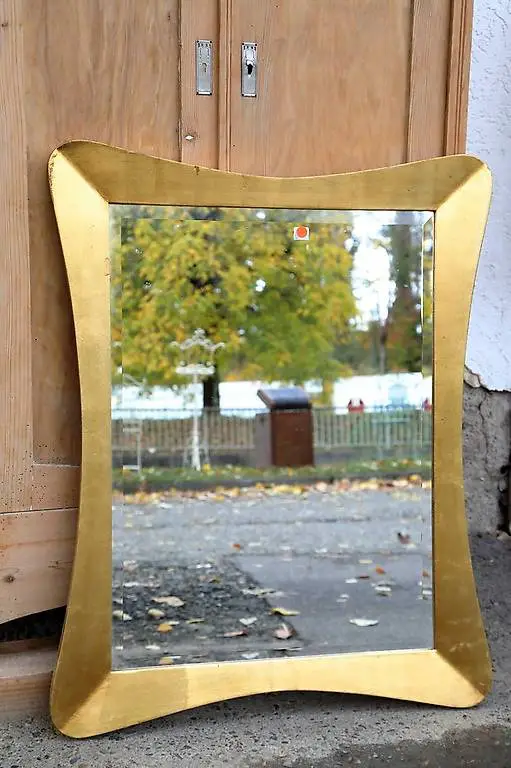 Spiegel geschwungen goldfarben