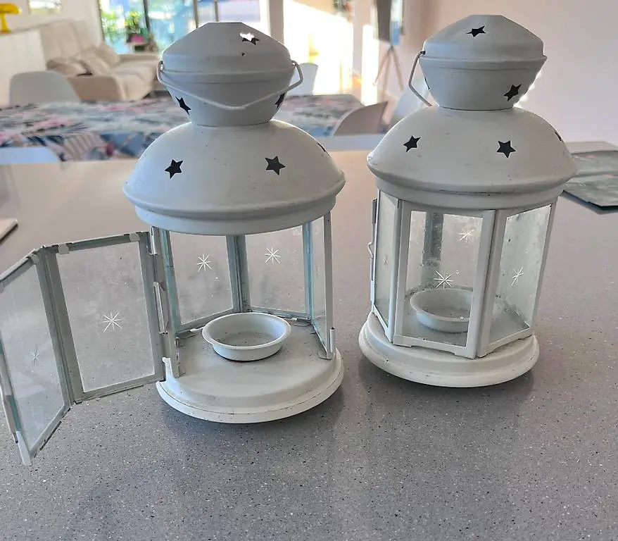 Coppia di lanterne in metallo per candela