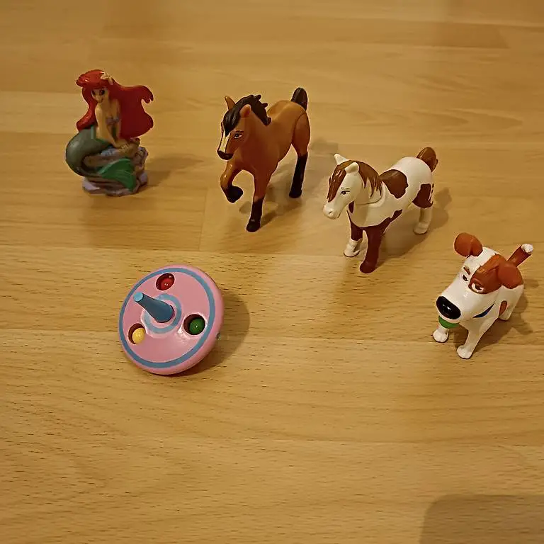 Spielfiguren und Zwirbel