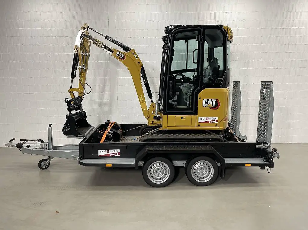 Bagger Cat 301.8 mieten mit Anhänger