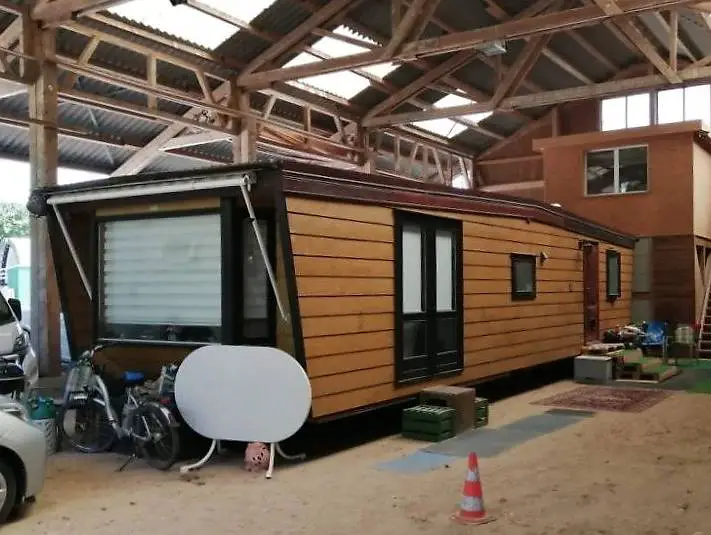 Holz-Chalet Occasion (12.00 x 3.60m)