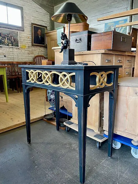 Tisch schwarz/gold aus Holz