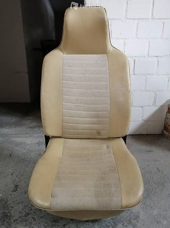 vw käfer 3 beine Sitz rechts mit hohe Kopfstützen.