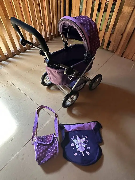 Puppenwagen in Lila mit Zubehör